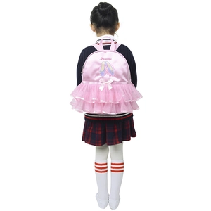 Close-up of pink ballet backpack with satin finish, tutu mesh skirt, and Dancing embroidery