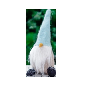 Blue felt Christmas gnome plush figurine with long white beard for holiday decoration