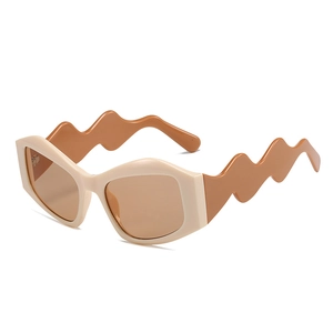 Chic irregular sunglasses with cream frame, brown lenses, and wavy caramel temples