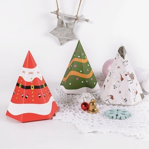 Three conical Christmas gift boxes with Santa and tree motifs on a festive background