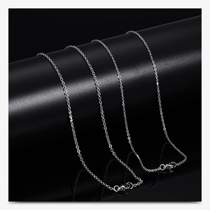 Detailed close-up of silver stainless steel O-chain with a secure lobster clasp closure
