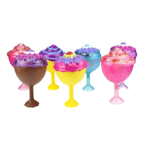 Close-up of scented princess cupcake dolls transforming from ice cream sundaes toy set