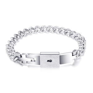 Interlocking silver chain link bracelet with matte lock charm on a white background