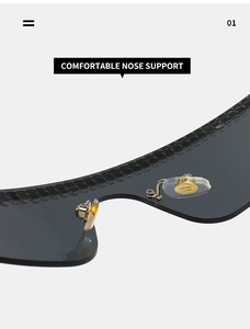 Détail de plaquettes de nez confortables avec touches dorées sur lunettes de soleil