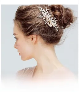 Detailed side view of bridal hair clip with white enamel flowers and clear crystals