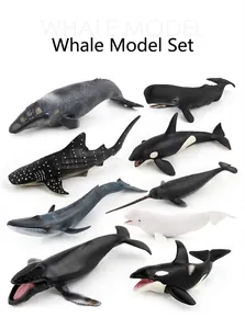 Set of nine realistic whale models including orca and narwhal made of textured resin