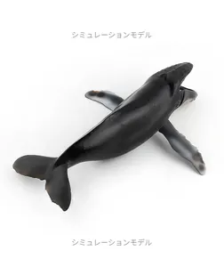 Detailed view of humpback whale model with open mouth and realistic gray fin markings