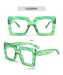 Front and 45-degree views of oversized square glasses with two-tone green striped frames