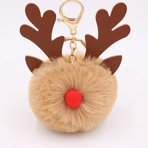Christmas reindeer plush pompom keychain with brown antlers and golden metal ring