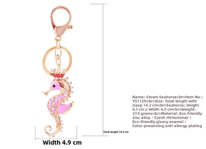 Detail of pink crown seahorse keychain with sparkling crystals and gold-tone lobster clasp