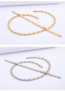 Detailvergleich zwischen goldenen und zweifarbigen Gliederketten aus Titanstahl
