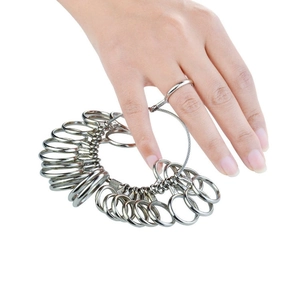 Finger sizing tool with various stainless steel rings for accurate jewelry measurement