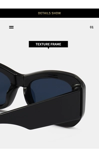 Detail showing high-gloss texture frame and wide temple joints of black retro sunglasses
