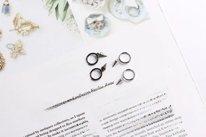 Punk style S925 silver hoop earrings with cone charms in black and silver finishes
