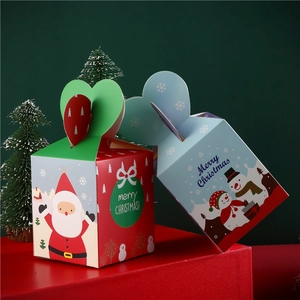 Festive Christmas gift box featuring Santa and Snowman patterns on a decorative red stand