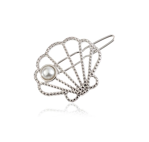 Detailed view of a silver metallic shell hair clip featuring a delicate pearl accent
