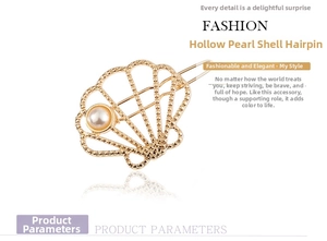Detail of a golden cutout scallop hair clip featuring a white pearl and metallic texture