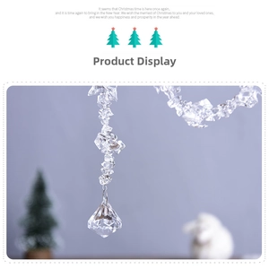 Macro detail of acrylic crystal snowflake beads and diamond pendant for Christmas decor