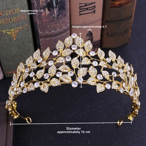 Detail of bridal gold leaf crown with white rhinestones, height 6.7cm and weight 125g