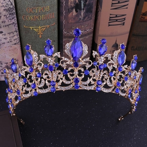 Baroque gold bridal crown with blue crystals and sparkling rhinestones for weddings