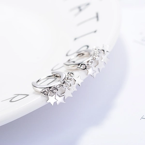 Elegant S925 silver star dangle earrings with five charms on a minimalist hoop design