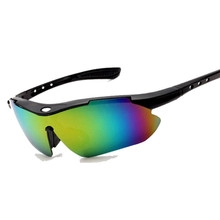 Detail view of ergonomic black cycling sunglasses with colorful rainbow coated lenses