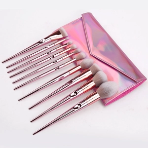 Professional 10-piece makeup brush set with rose gold handles and pink holographic bag