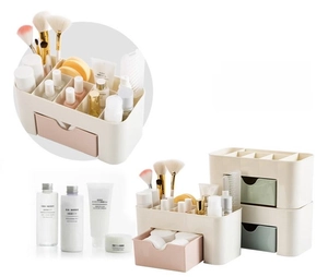 Detail of multi-grid cosmetic organizer with drawer for makeup brushes and skincare