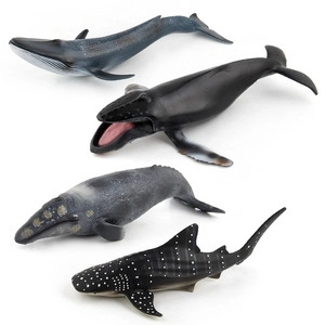 Educational ocean animal toy set featuring realistic blue whale, shark, and humpback models