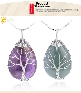 Detail of tree of life wire-wrapped water drop crystal pendants on ball chains