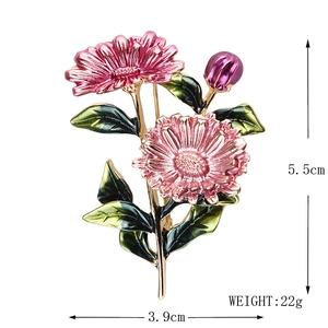 Fashionable floral enamel brooch with pink flowers and green leaves in golden alloy