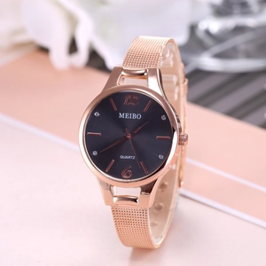 Detail of rose gold mesh band watch with black dial and crystal markers by Meibo