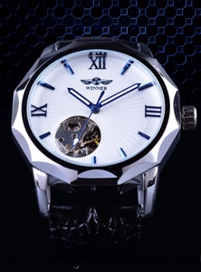 Detail view of the white sunburst dial with blue Roman numerals and visible skeleton movement