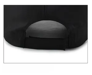 Detail of adjustable velcro closure on black breathable baseball cap for custom fit