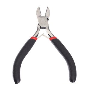 Detail of steel wire cutters with anti-slip black handles and red ring for DIY crafts