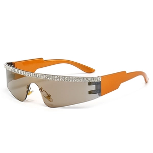 Lunettes de soleil punk sans monture avec branches orange et verres ornés de strass