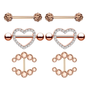 Detail view of rose gold nipple rings with heart and marquise cubic zirconia studs