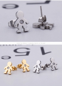 Detailed view of titanium steel stud earrings in boy shape with central rhinestone