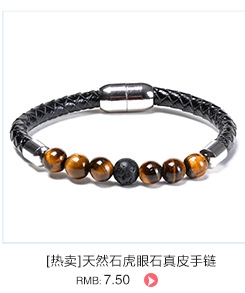 Gros plan détaillé des perles en oeil de tigre sur un bracelet multicouche en cuir tressé