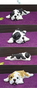 Detailed views of realistic resin bulldog puppy figurines in black and white patches