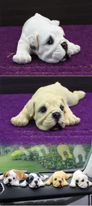 Detail of realistic resin English bulldog figurines showing skin texture and car dashboard placement