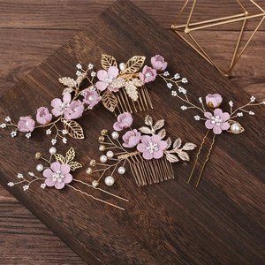 Detailed set of 4 bridal hair accessories with pink fabric flowers and white pearls