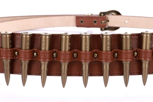 Detail of dark brown leather belt with gold metal bullet studs for punk cosplay styling