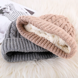 Detail showing plush fleece lining of knit mohair hats for winter warmth and comfort