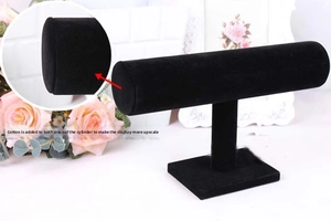 Detail view of T-bar jewelry display stand with black velvet and cotton-padded cylinder ends