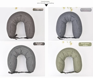 Detail view of U-shaped neck pillows in four striped colors with adjustable buckle