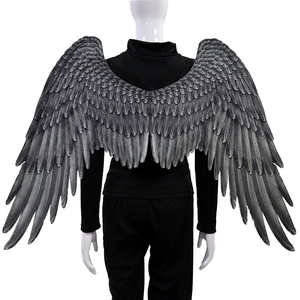 Macro detail of large grey gradient angel wings with realistic feather print texture