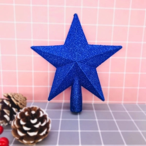Close-up of blue glittered 3D star tree topper with conical base for Christmas decor