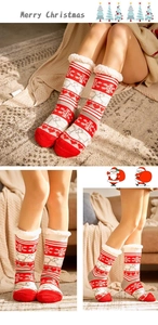 Detailed view of red Christmas fleece socks with reindeer and snowflake patterns