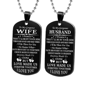 Pair of black stainless steel dog tag necklaces with husband and wife love engravings